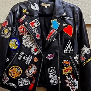 Trade or make offer on Embellished Vegan faux leather jacket with patches.